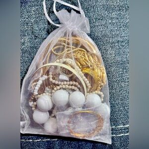 Gold and white tone Mystery Jewelry bag Vintage & Modern Costume Jewelry